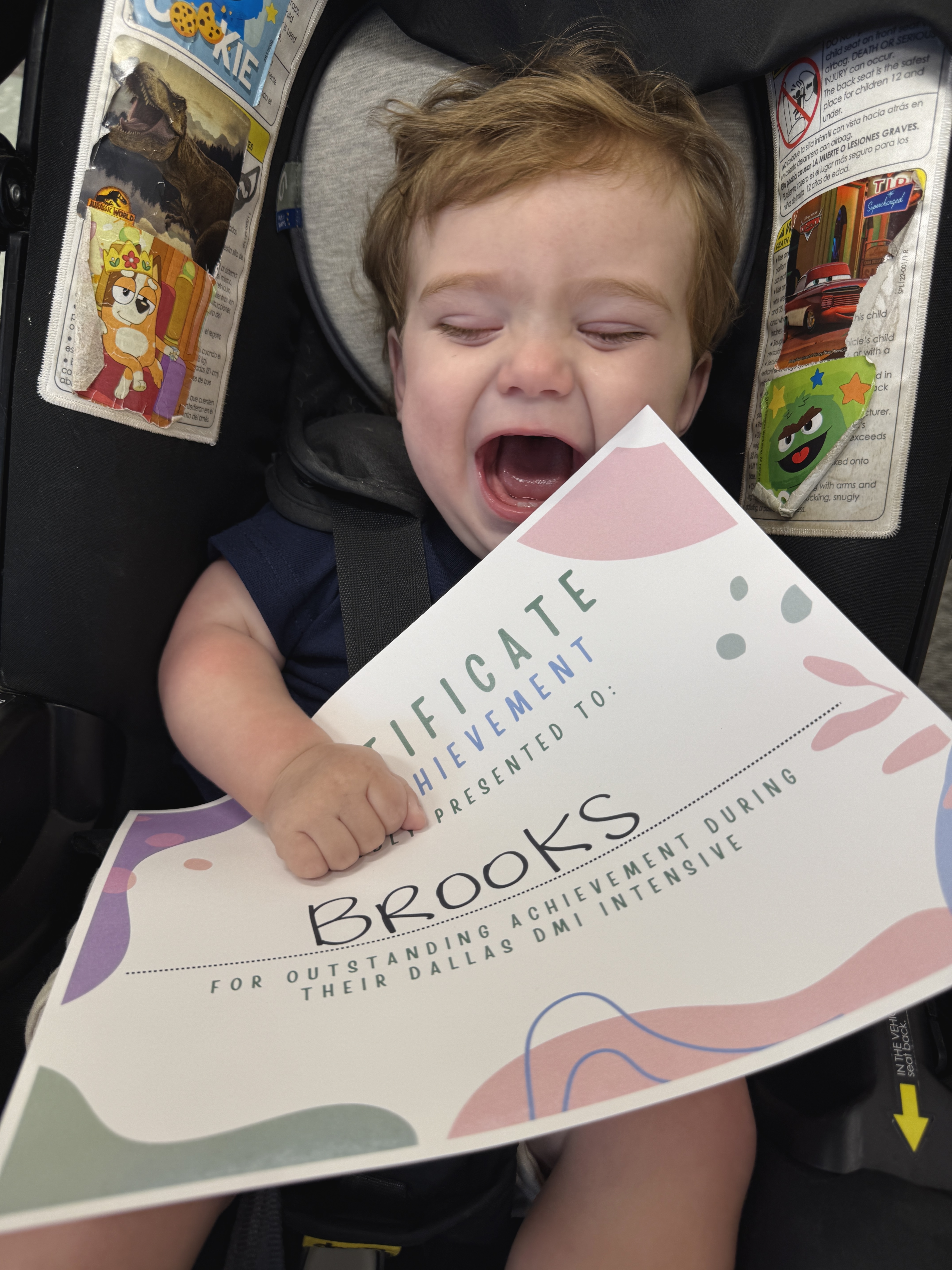 Brooks in his car seat